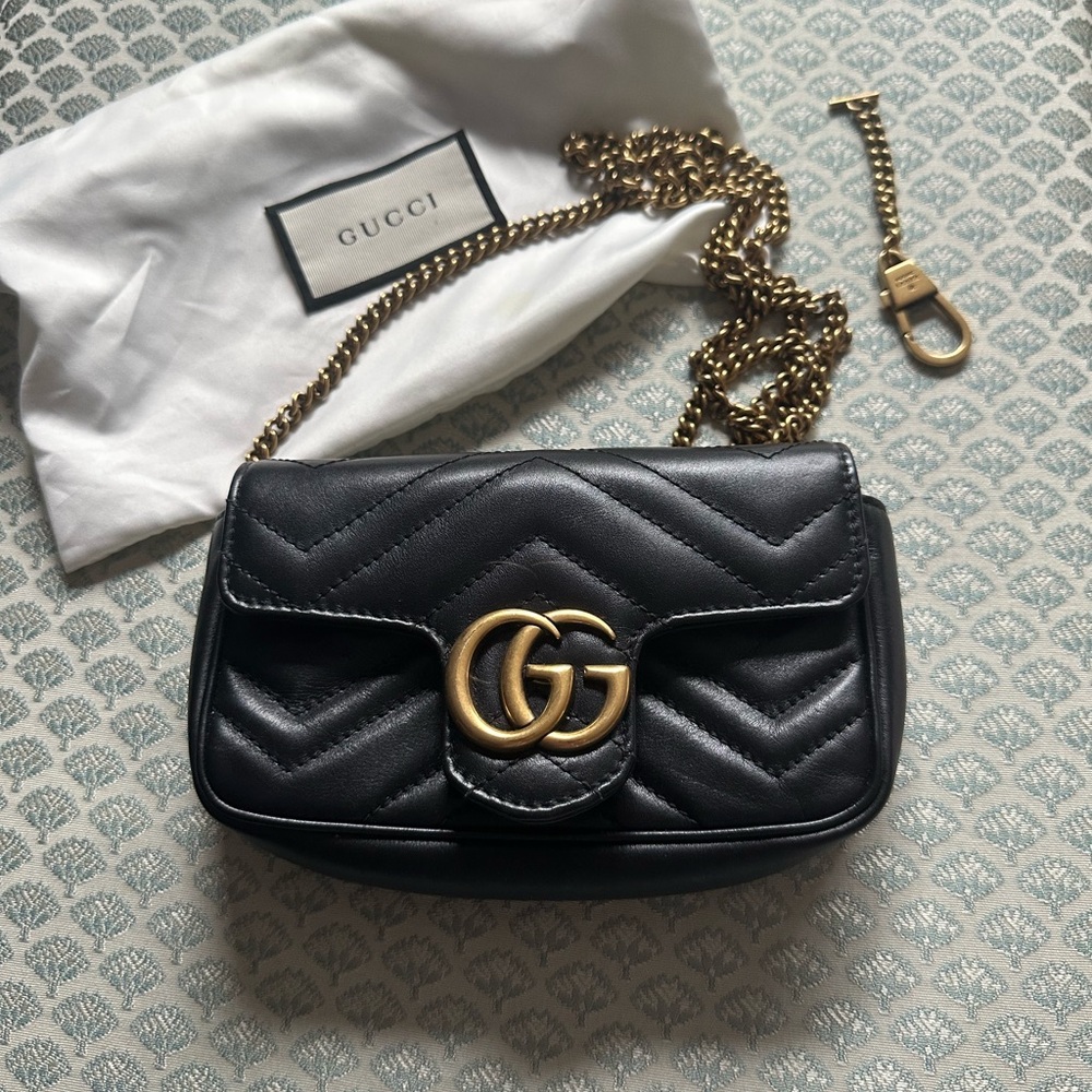 Gucci super mini Marmont (Black Quilted Crossbody Bag with Gold Chain).